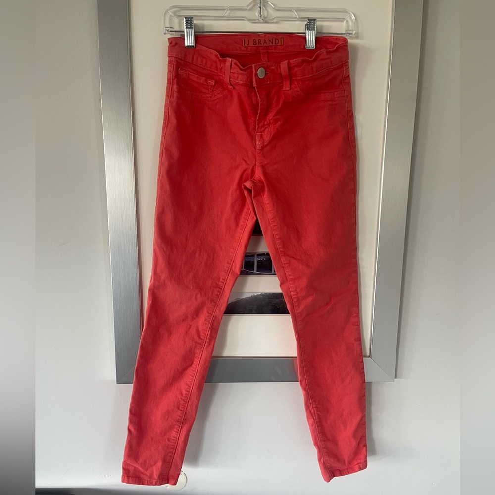 J Brand jeans in a bright tomato orange/red